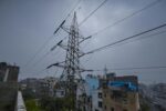 High tension wires above residential houses in Gan 1734974682119